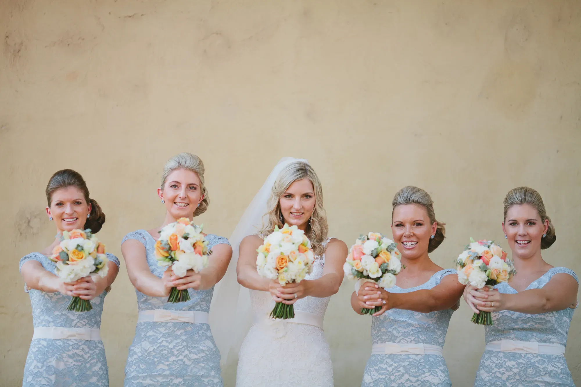 A bride and her four bridesmaids, hair and makeup by Bellus