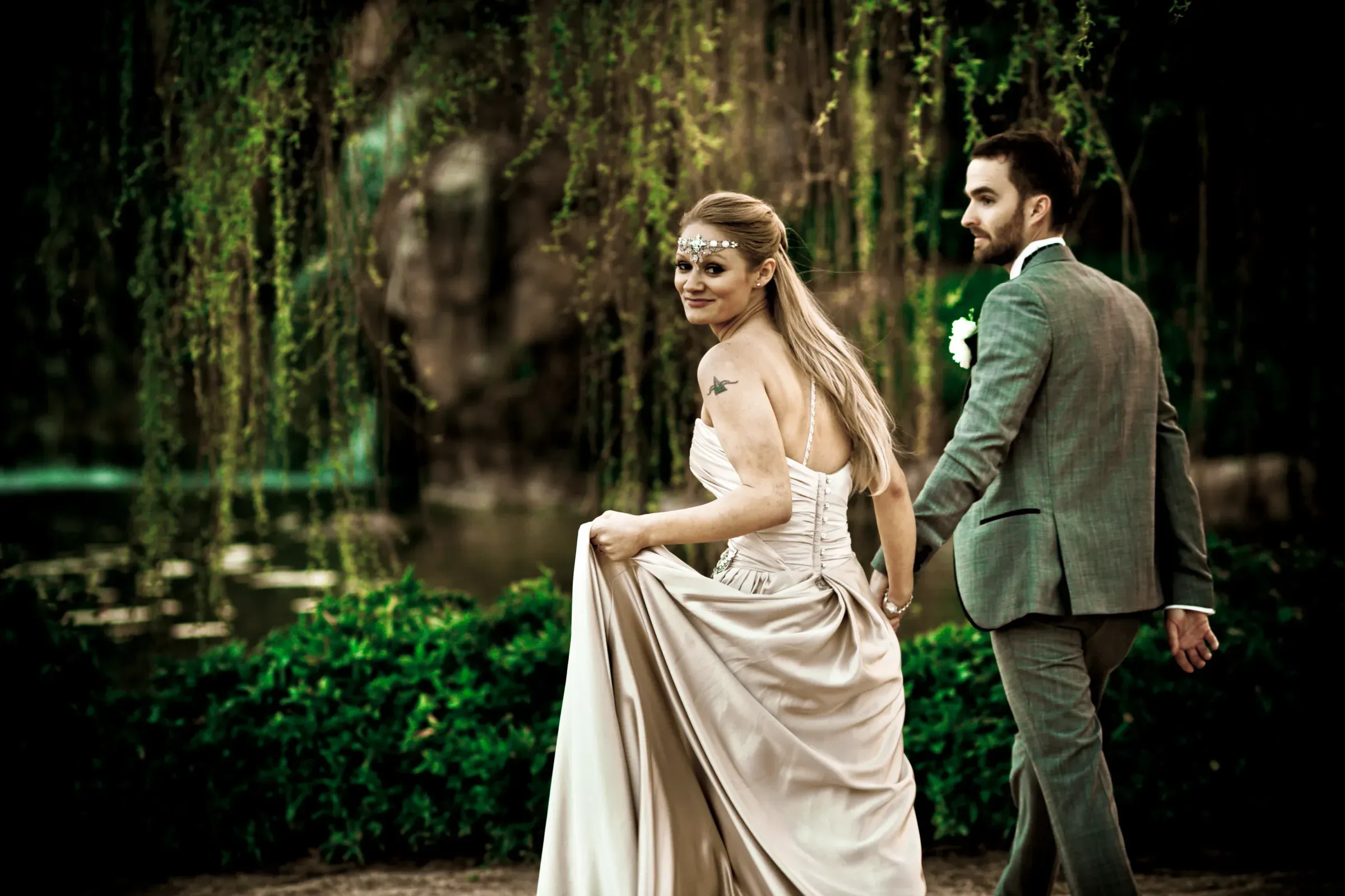 An eloping couple photographed in a garden, hair and makeup by Amanda Frost