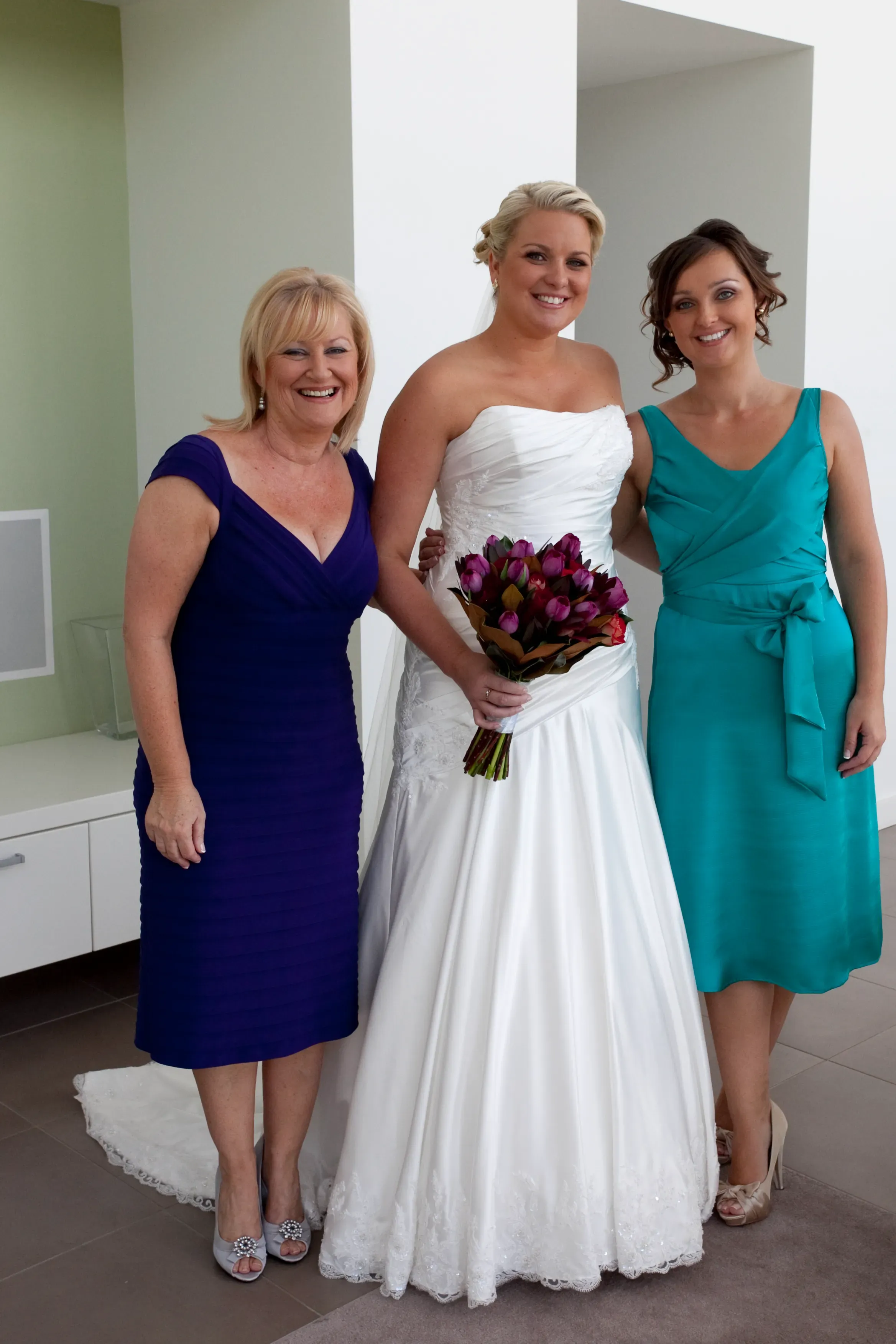 The mother of the bride photographed with her daughter before the ceremony, hair and makeup by Amanda Frost