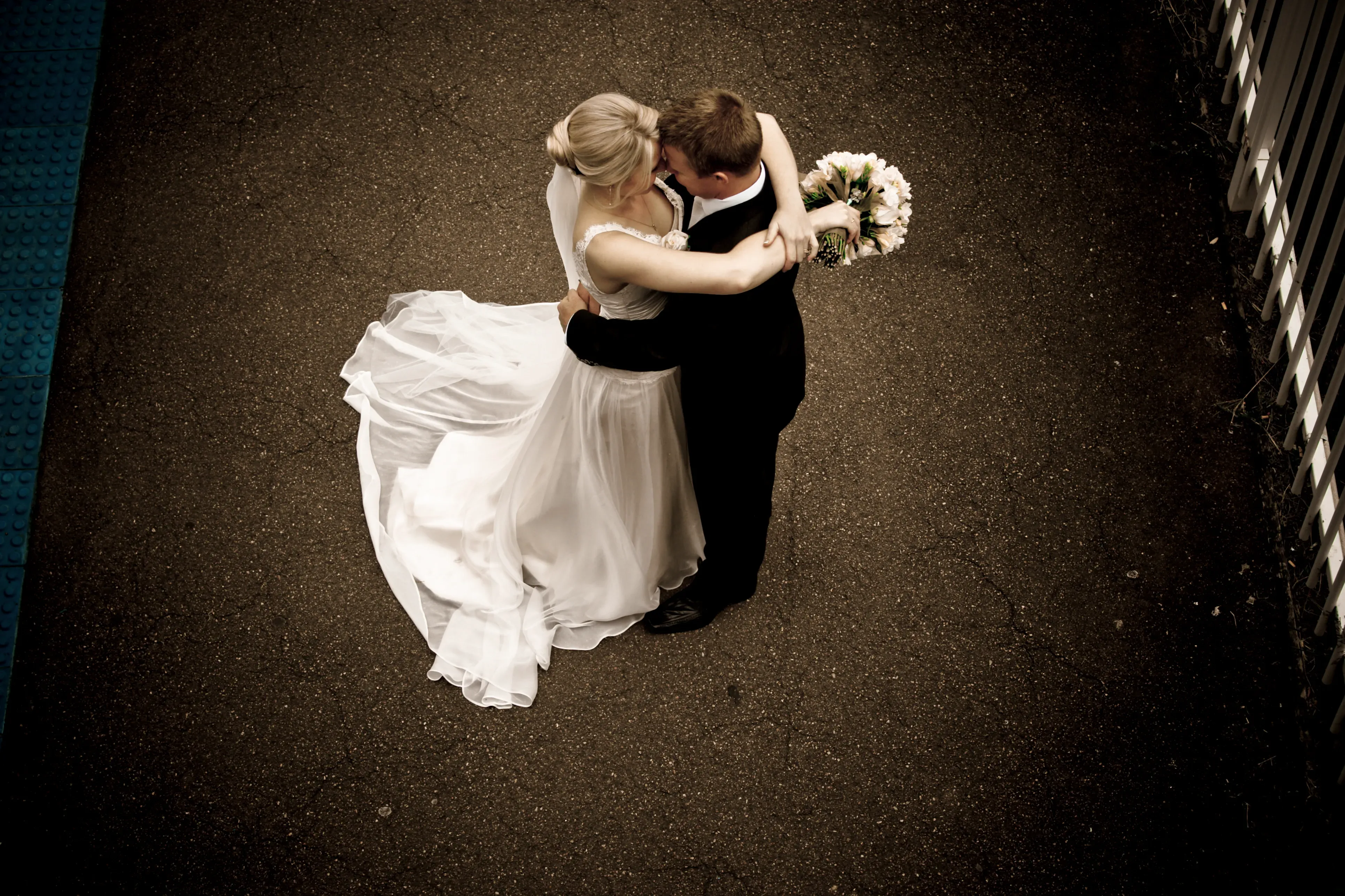 A couple photographed from above on the wedding day, the bride styled that morning by Amanda Frost