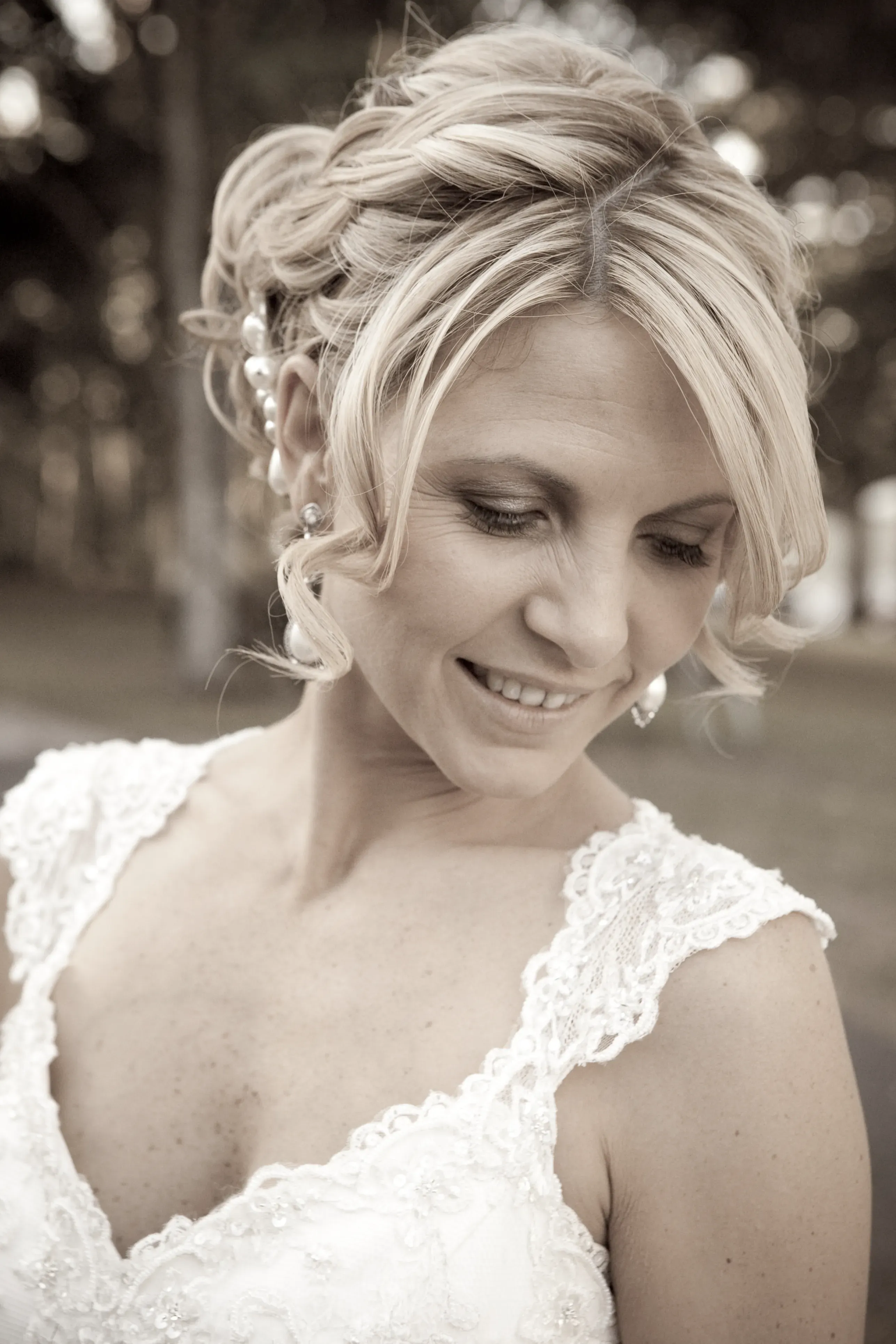 Hunter Valley wedding hair and makeup, a relaxed bridal updo with a lace gown