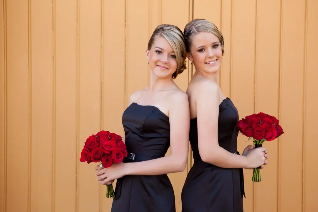 Bridal party bridesmaids red bouquets