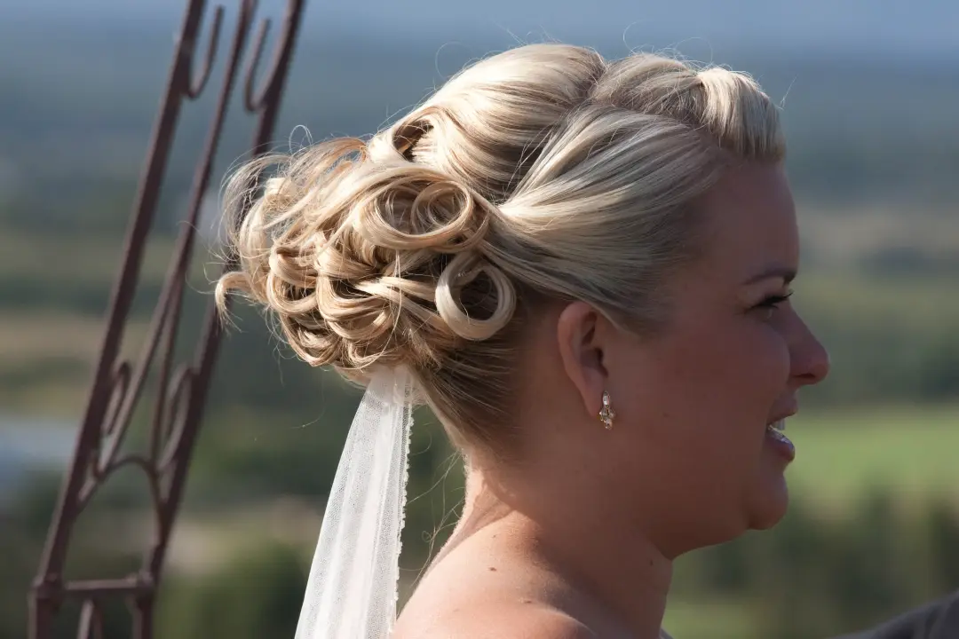 The finished wedding hair and makeup by Amanda Frost of Bellus on location