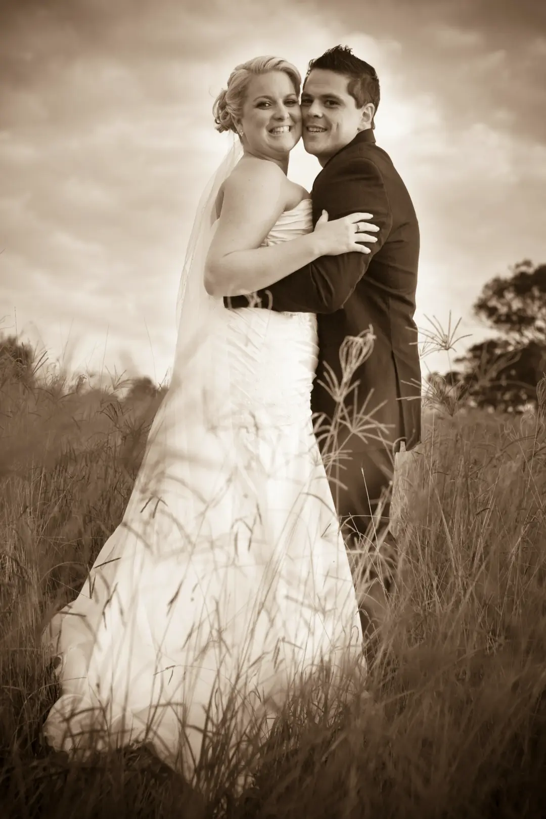 The finished bridal hair and makeup by Amanda Frost of Bellus at a real wedding